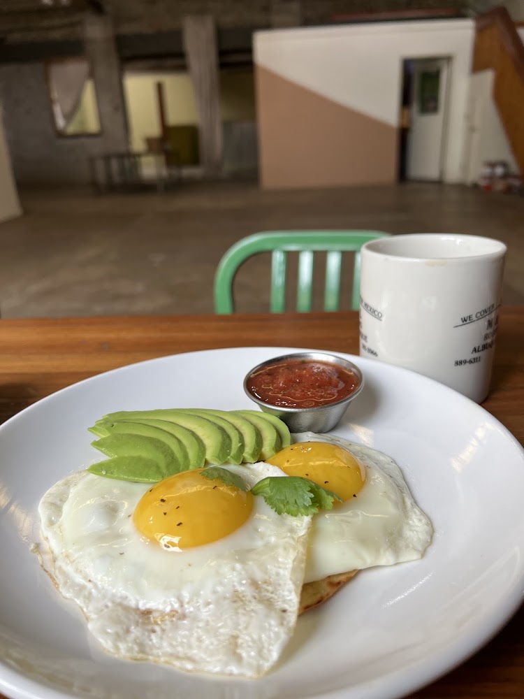 Huevos rancheros with eggs, avocado and salsa at Tooley's Cafe